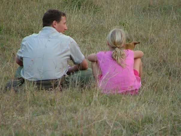 Outdoor wedding ceremony at golden hour